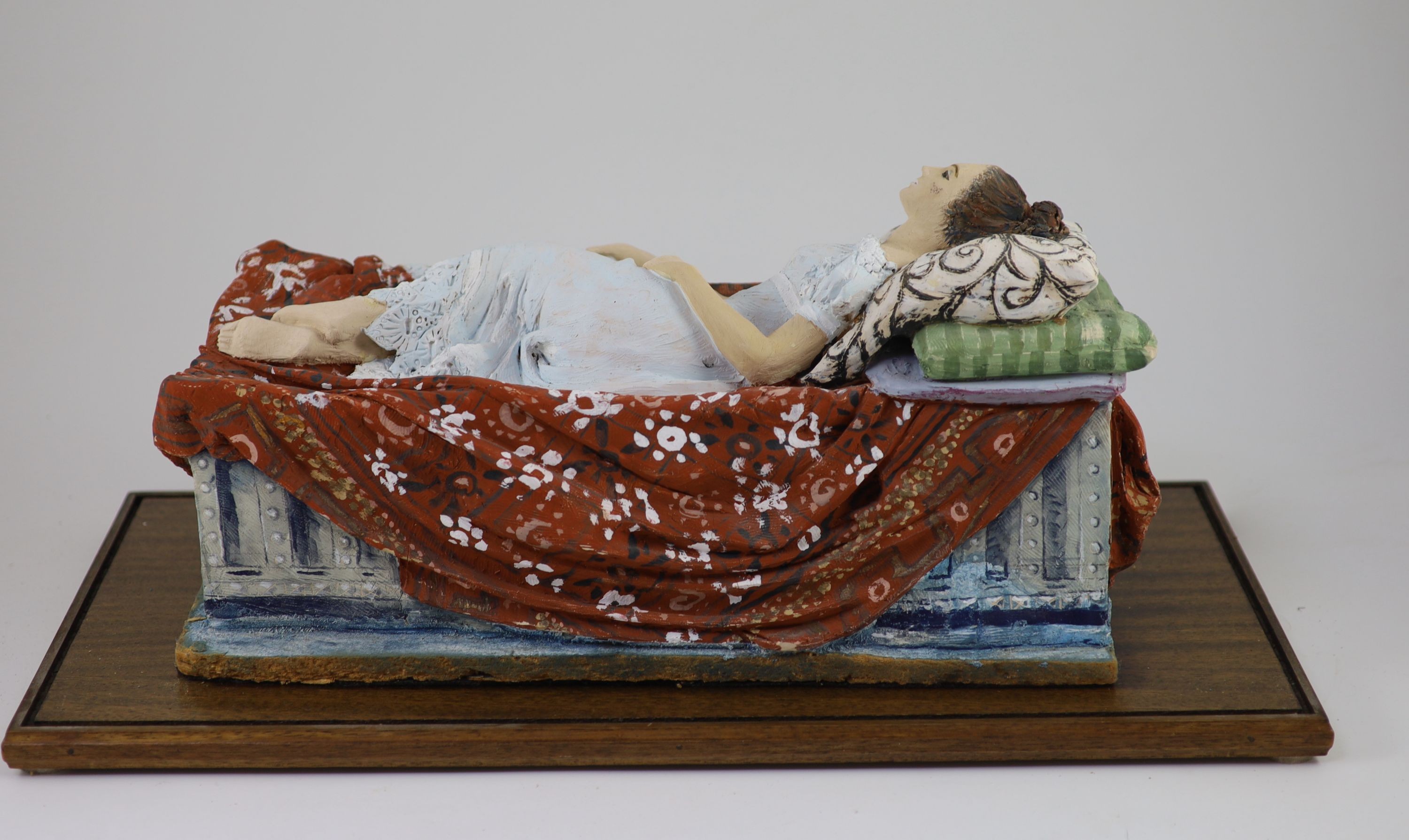 Quentin Bell (1910-1996), painted terracotta figure 'Sleeping Beauty', 45.5 cm long, 23 cm high, 19.5 cm wide, Housed in a glazed case